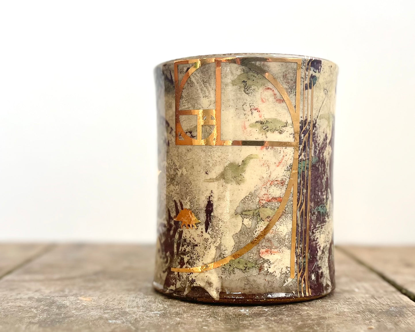 Mug with slip, gold decals and image transfer
