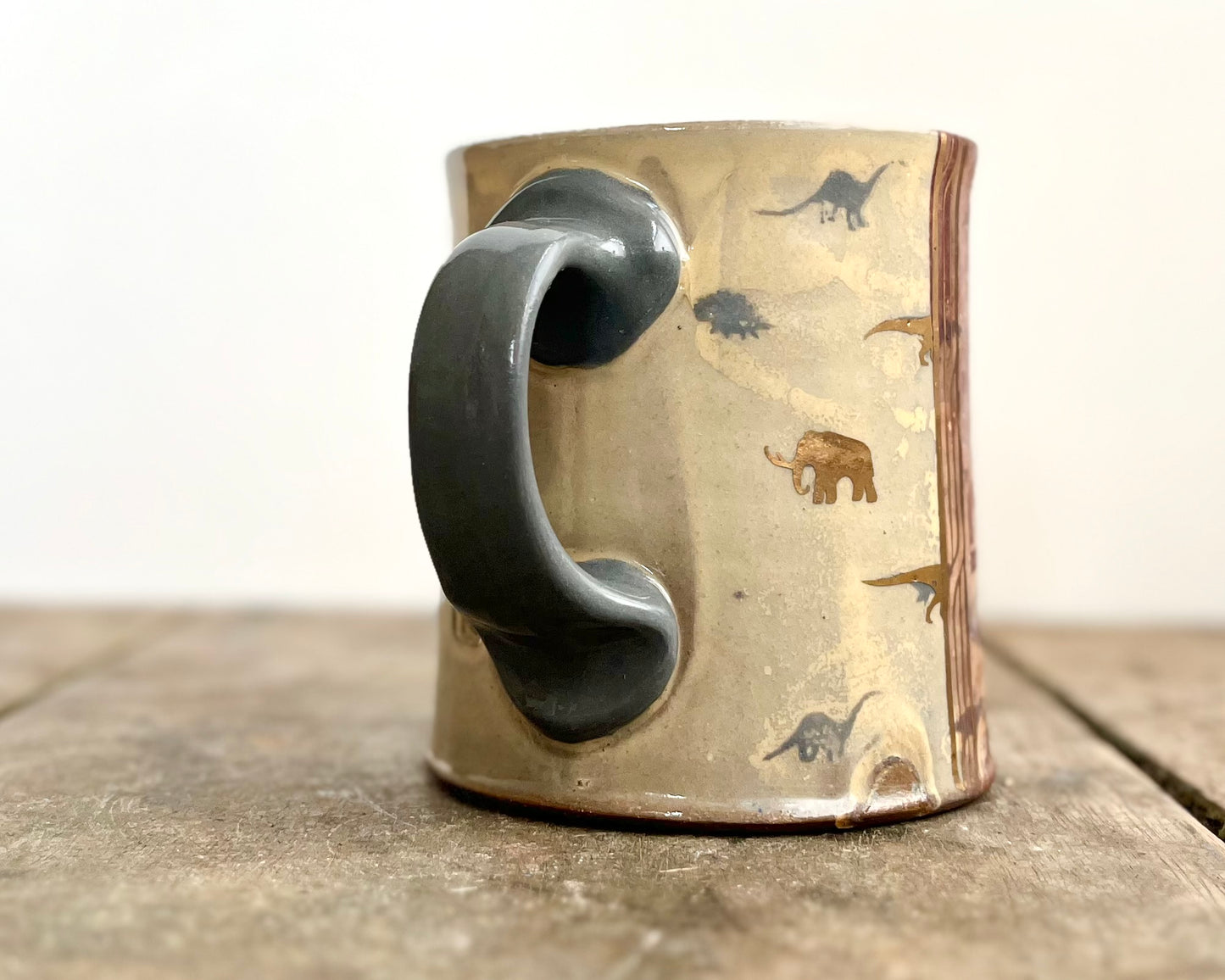 Mug with slip, gold decals and image transfer
