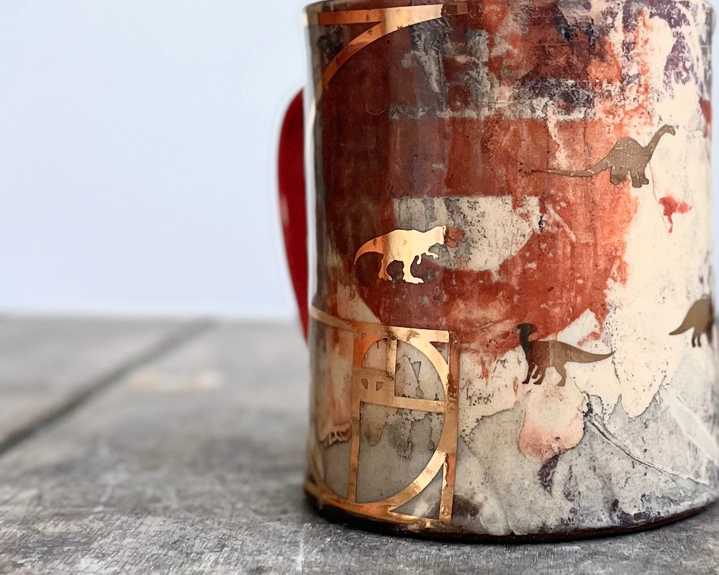 Mug with slip, gold decals and image transfer
