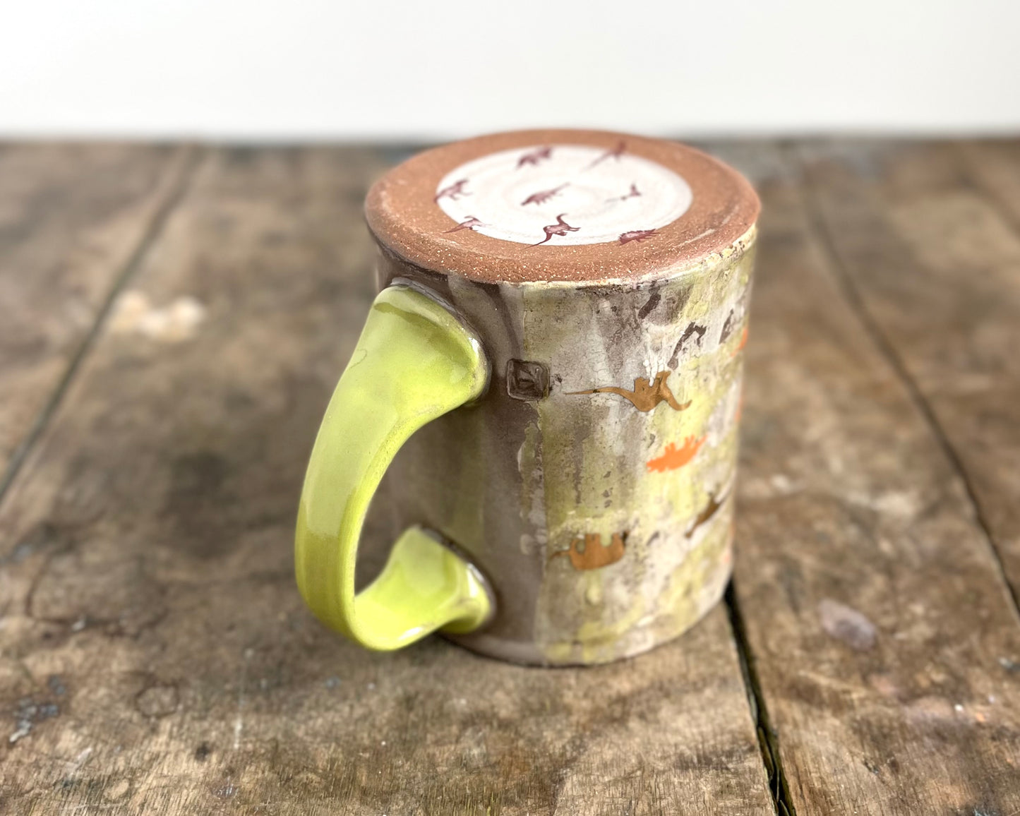 Mug with slip, gold decals and image transfer