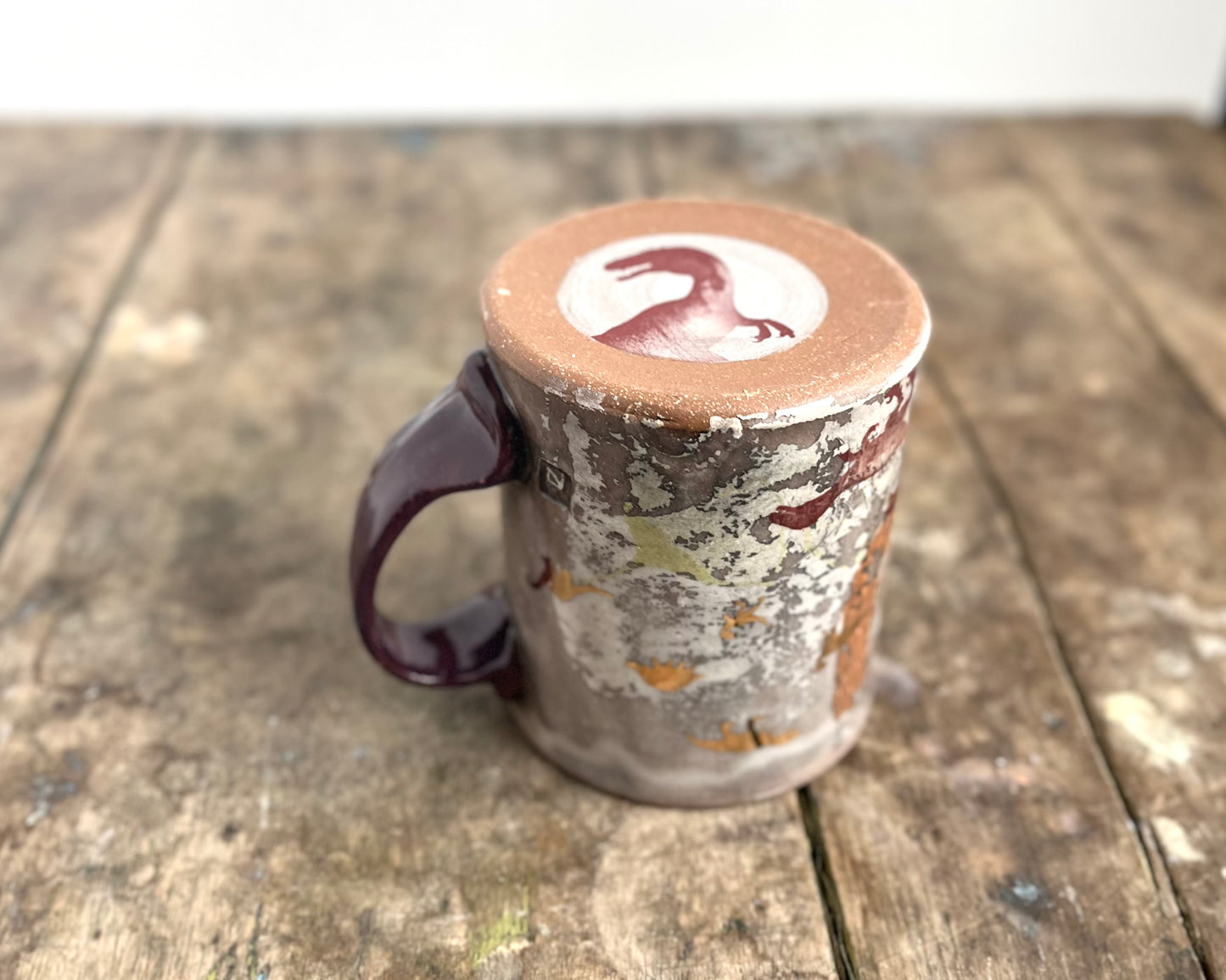 Mug with slip, gold decals and image transfer