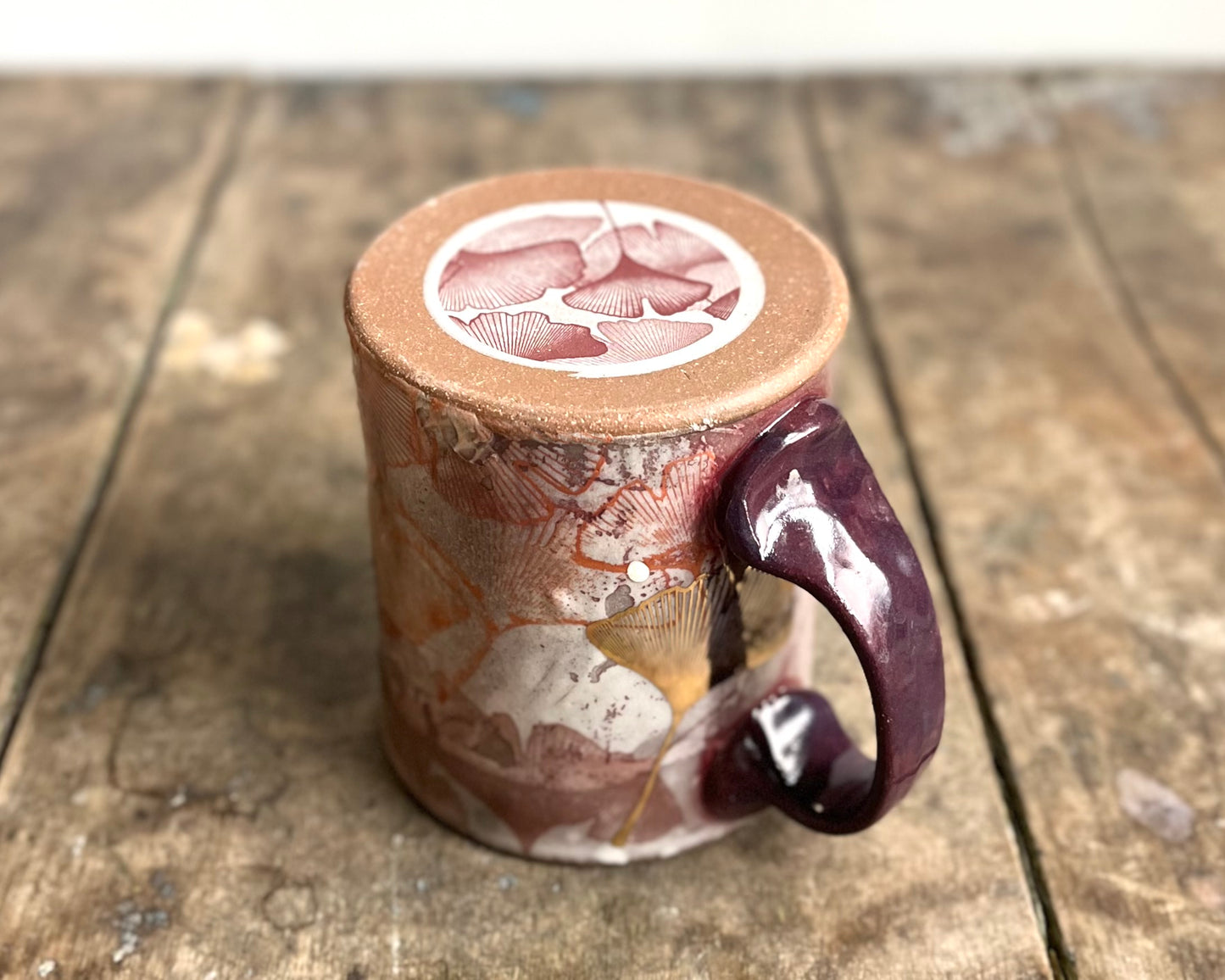 Mug with slip, gold decals and image transfer
