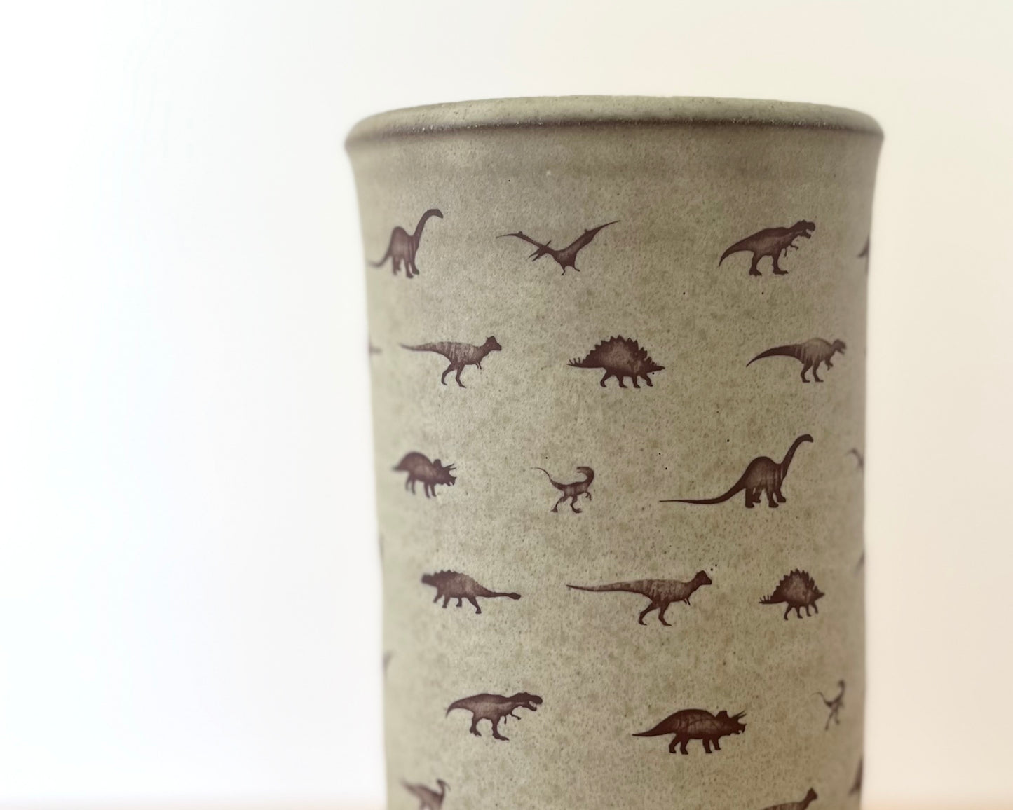 Cylindrical Vase with little dinosaurs - warm grey matte