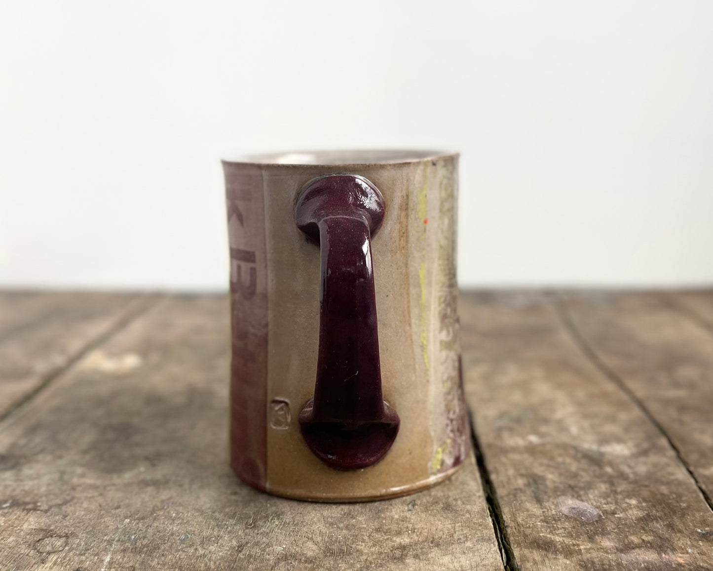 Mug with slip, gold decals and image transfer