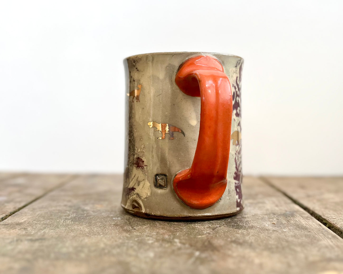 Mug with slip, gold decals and image transfer