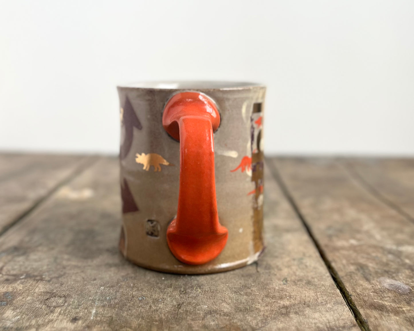 Mug with slip, gold decals and image transfer