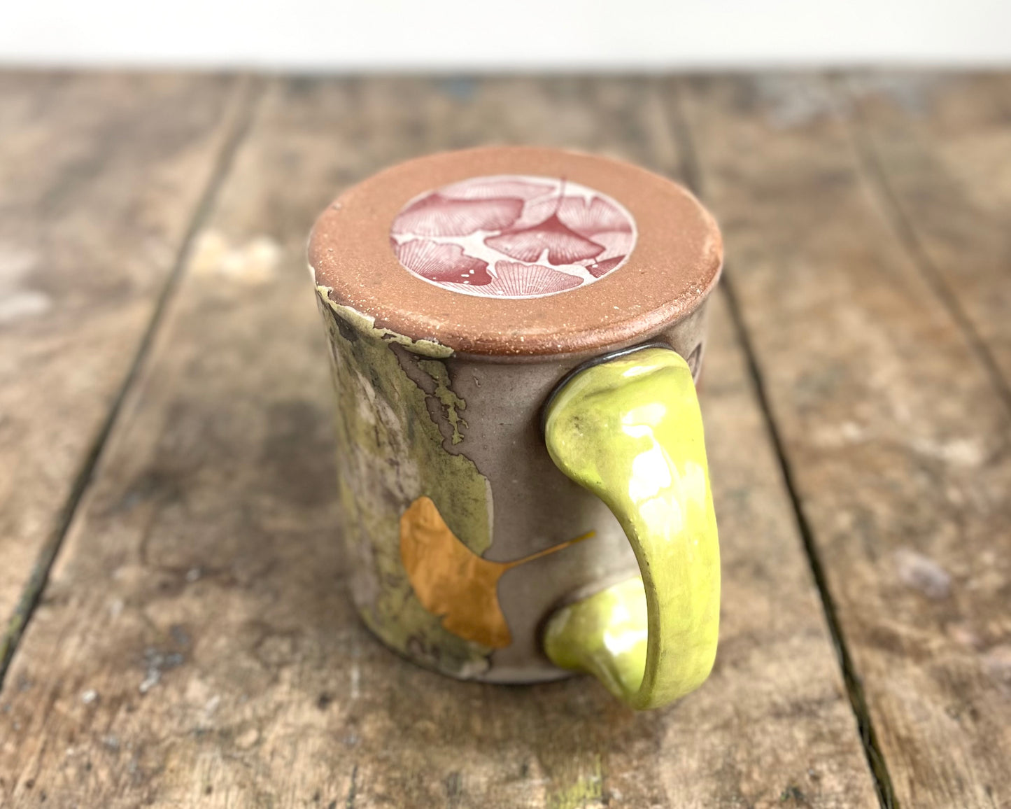 Mug with slip, gold decals and image transfer
