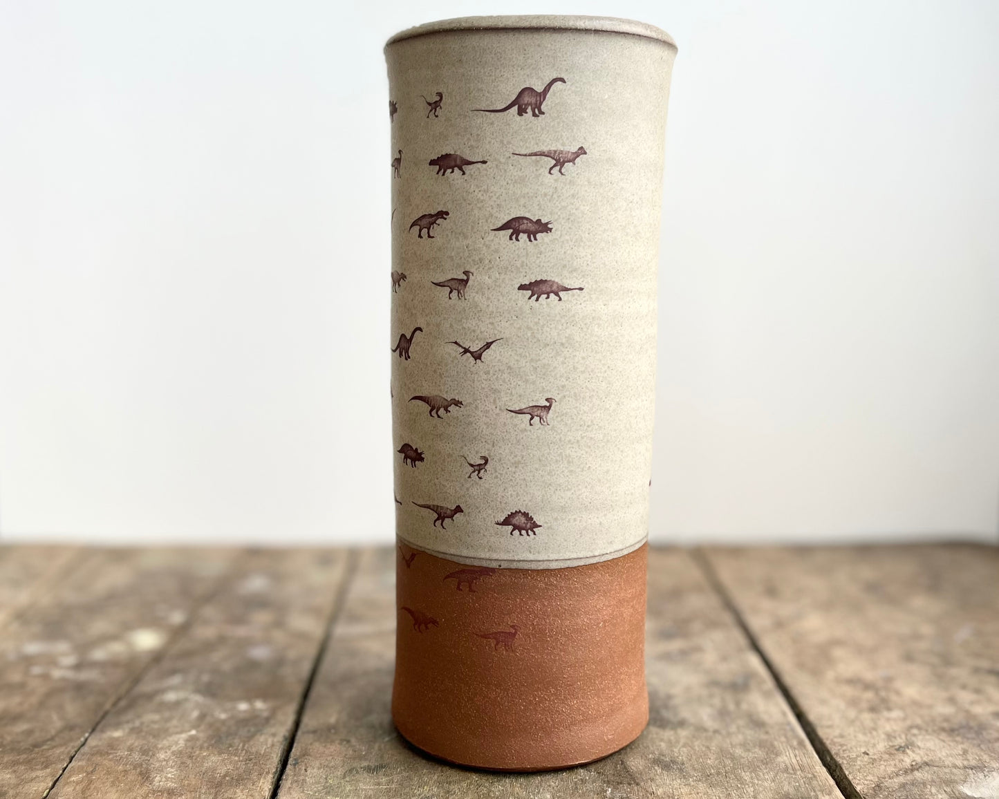 Cylindrical Vase with little dinosaurs - warm grey matte