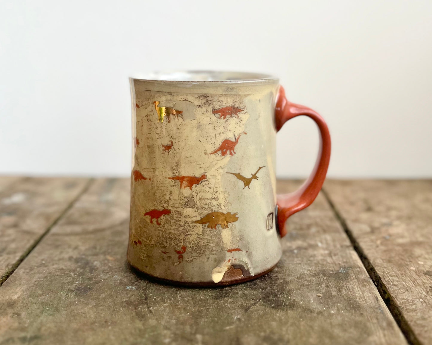 Mug with slip, gold decals and image transfer