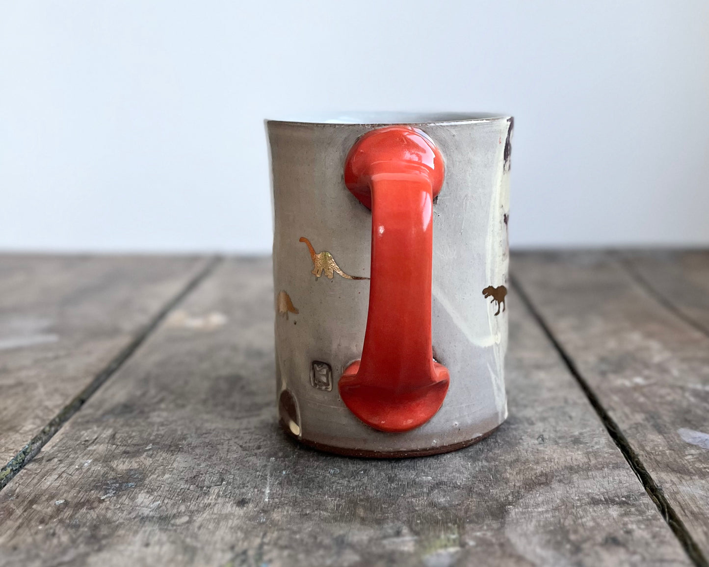 Mug with slip, gold decals and image transfer