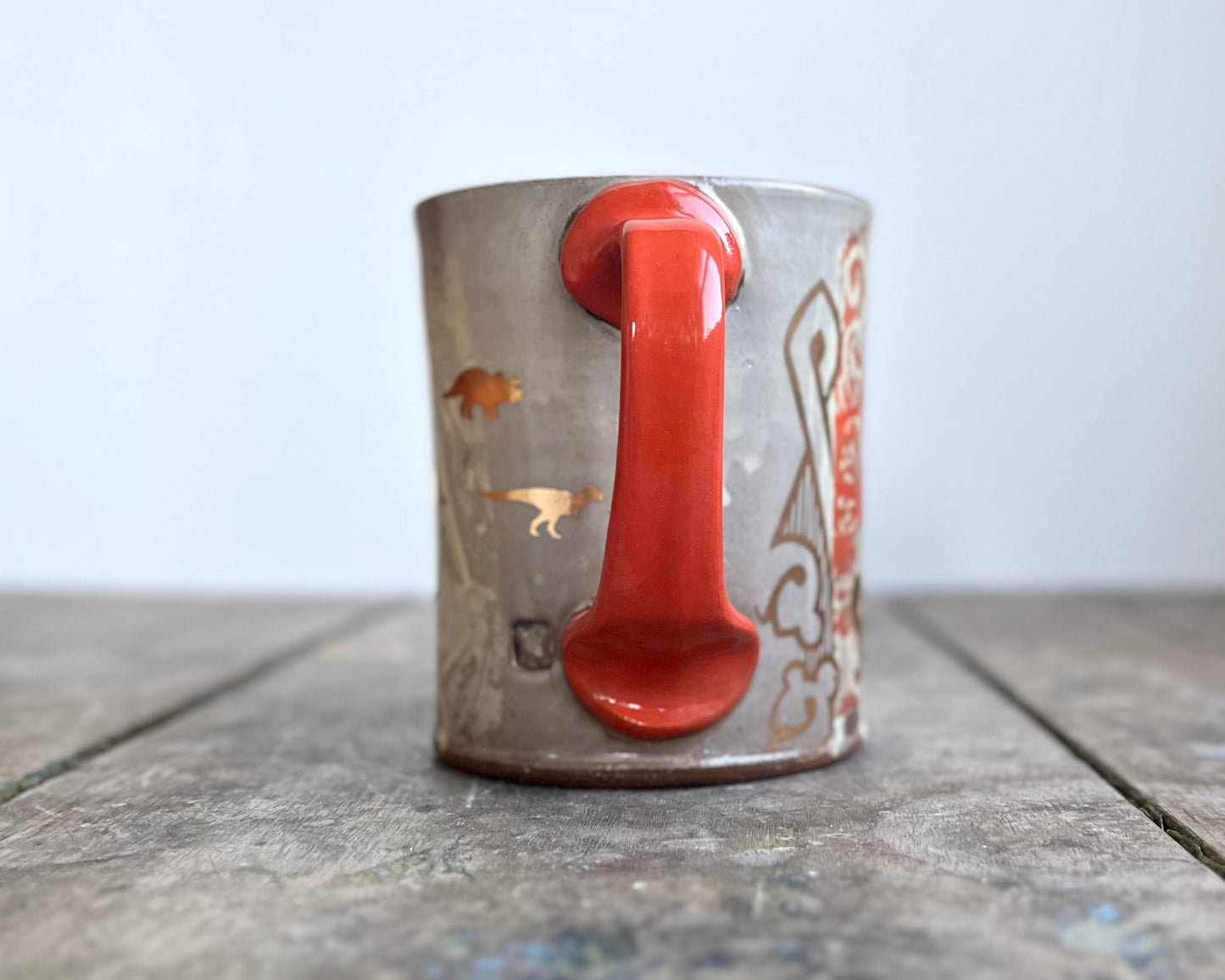 Mug with slip, gold decals and image transfer