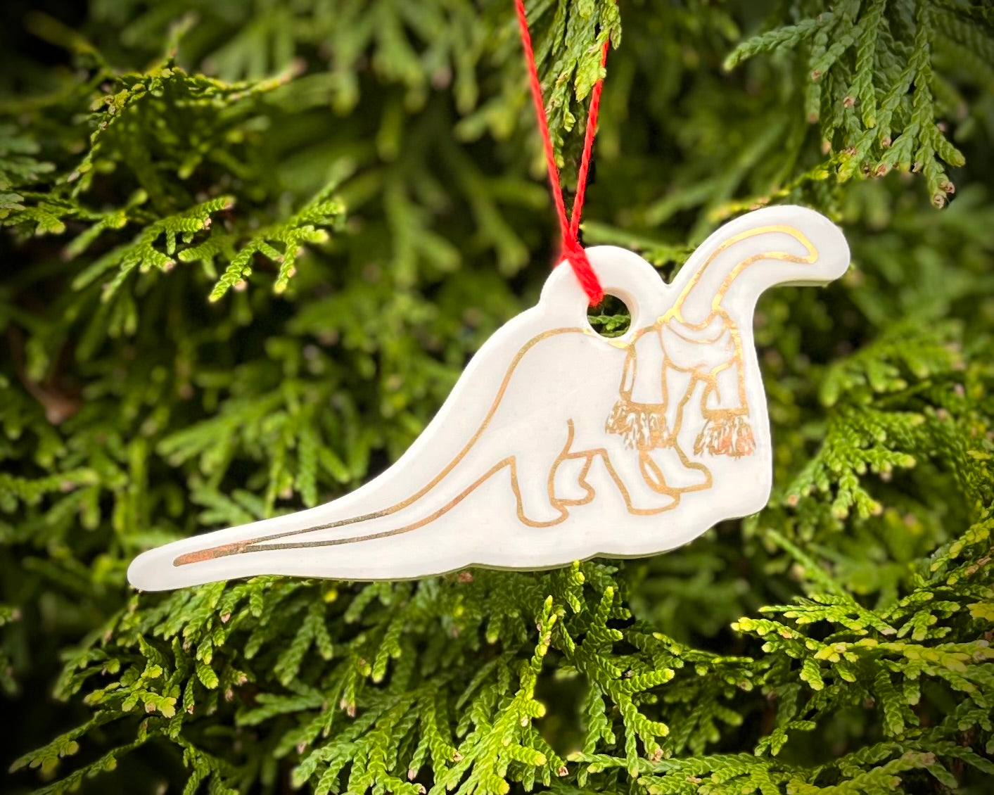 Diplodocus with scarf ornament