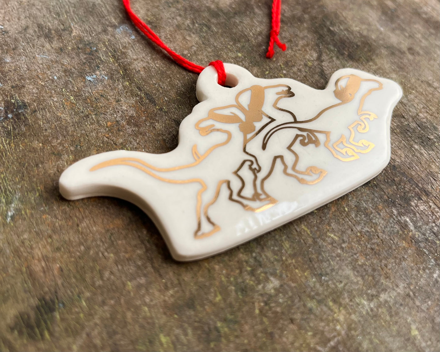 Velociraptor pack ornament