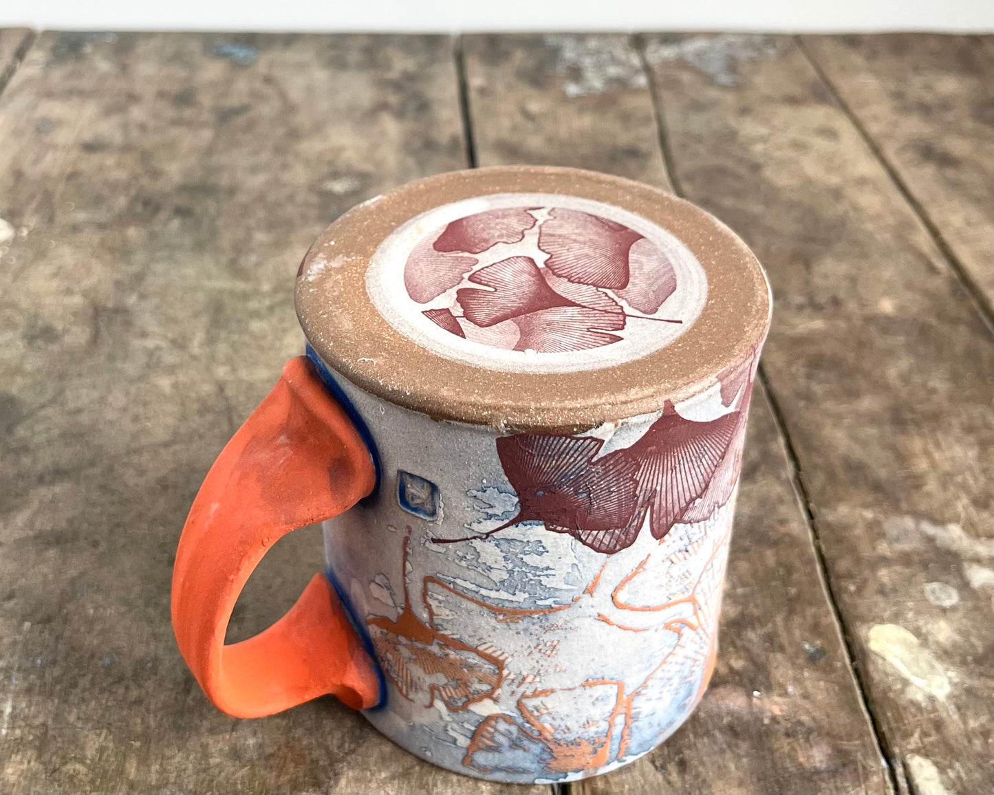 Mug with slip, gold decals and image transfer