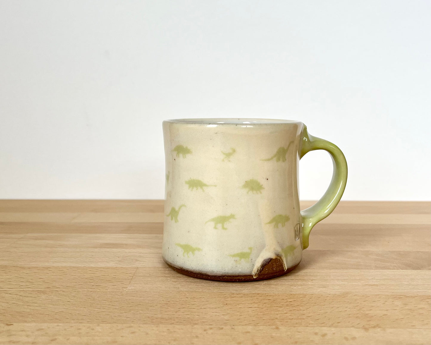 Mug with small chartreuse dinos