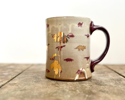 Mug with slip, gold decals and image transfer