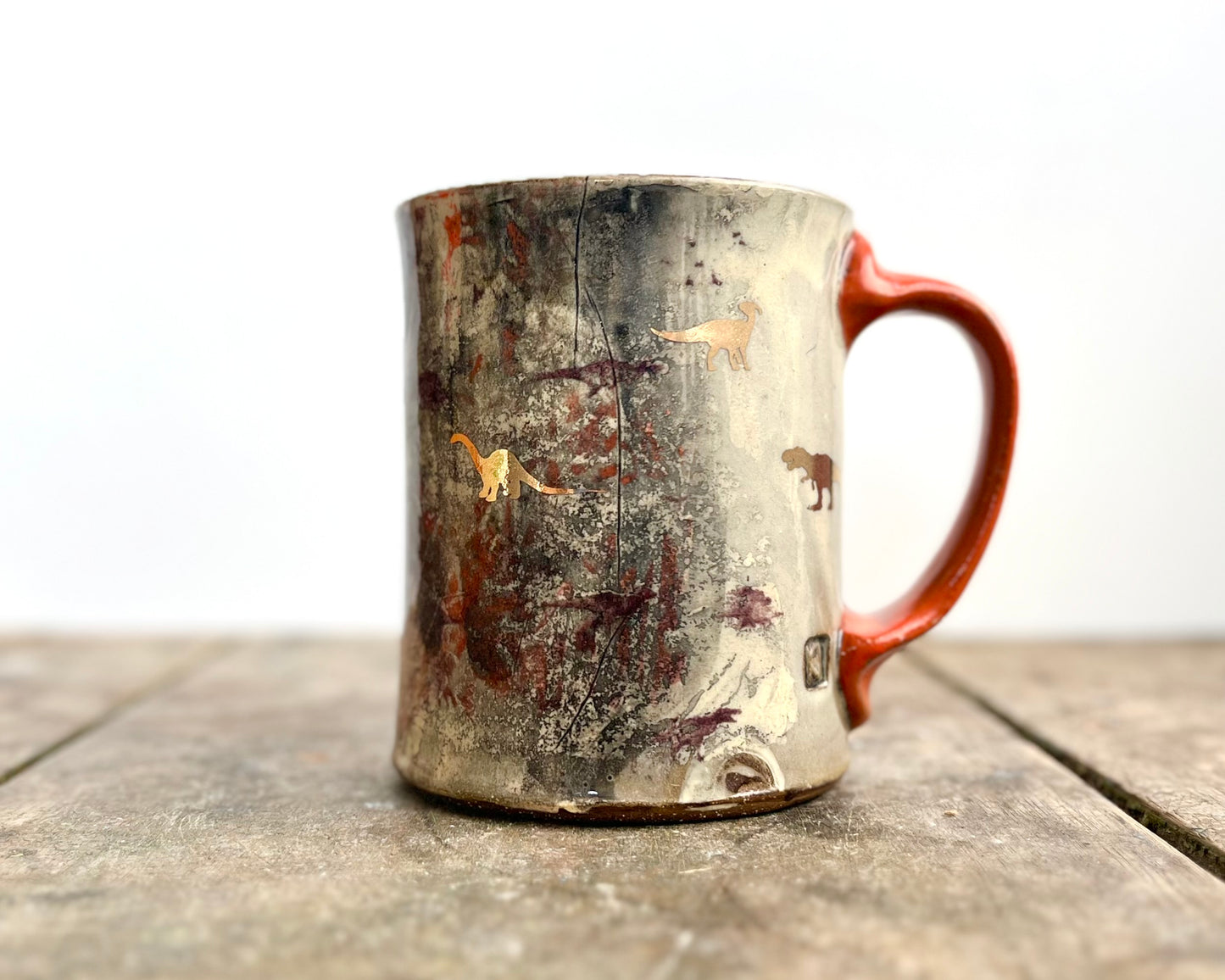 Mug with slip, gold decals and image transfer