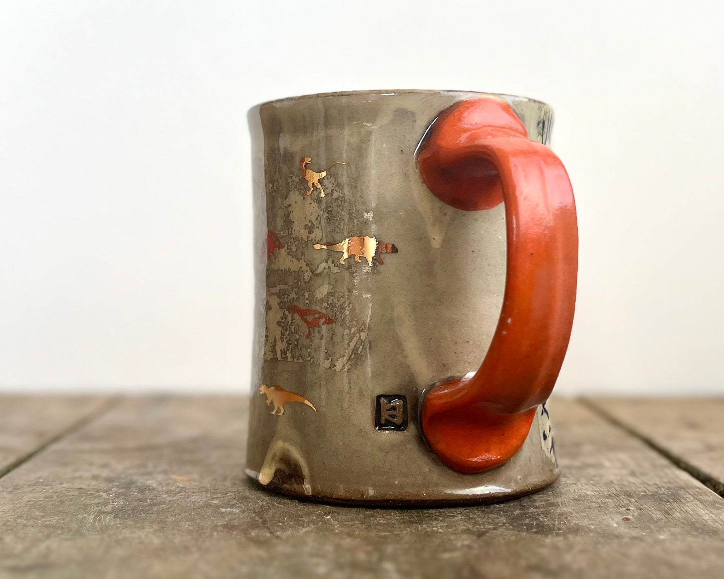 Mug with slip, gold decals and image transfer