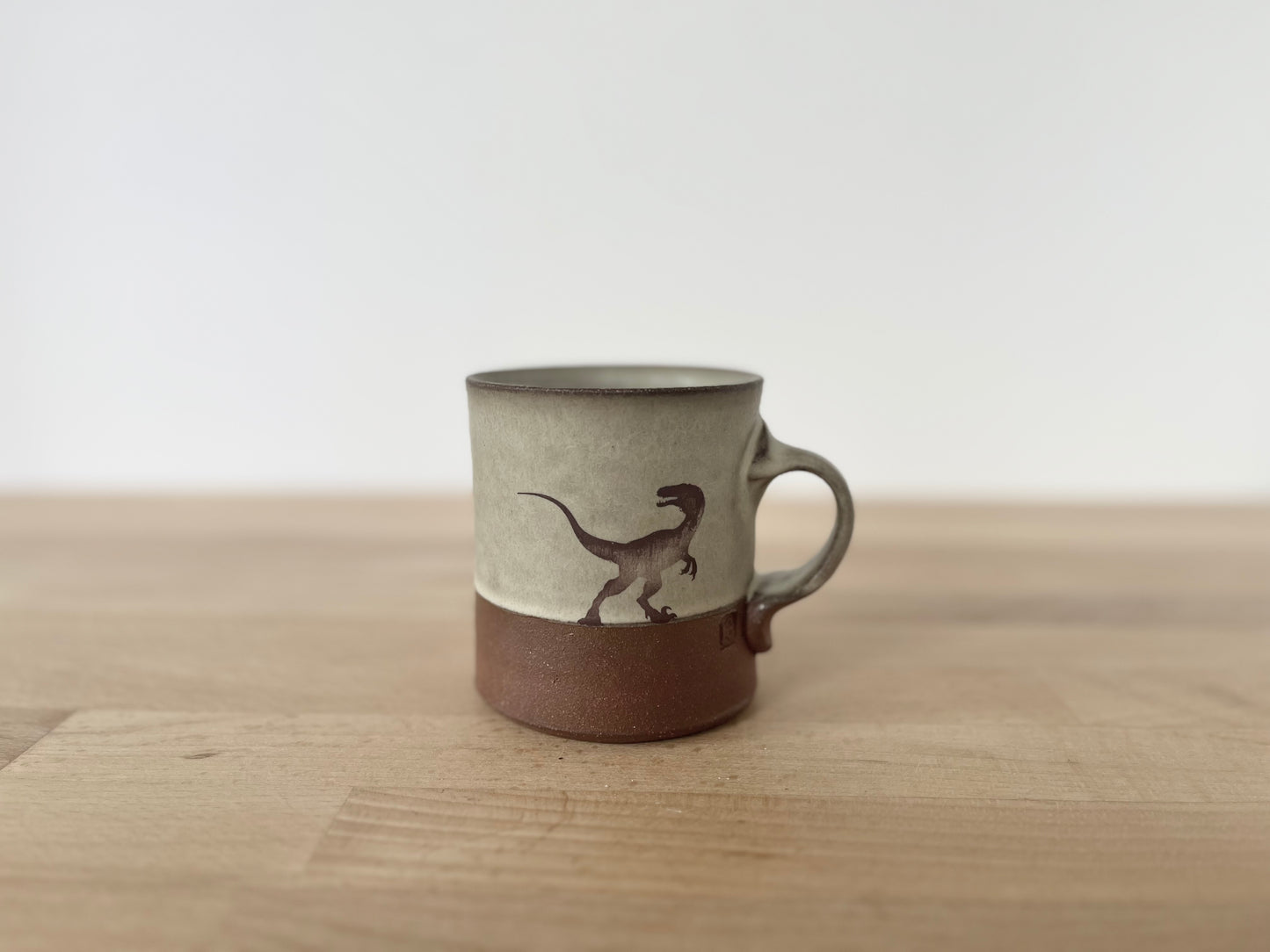 Velociraptor Americano Mug - warm grey matte