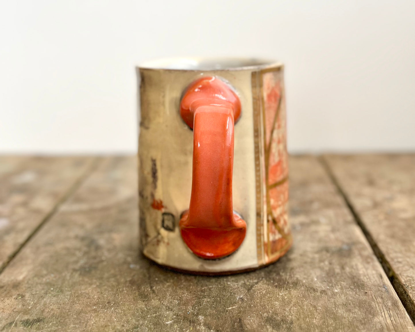 Mug with slip, gold decals and image transfer