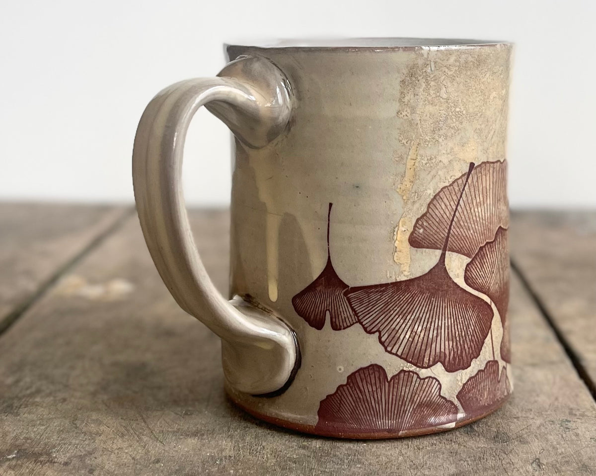 White Mug with slip, gold velociraptor and image transfer