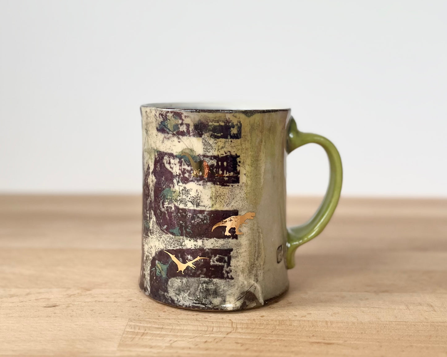 Mug with slip, gold decals and image transfer