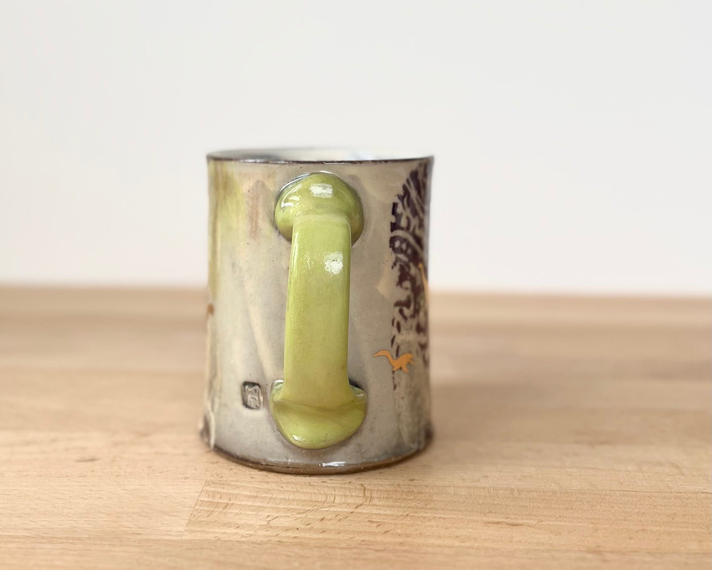 Mug with slip, gold decals and image transfer