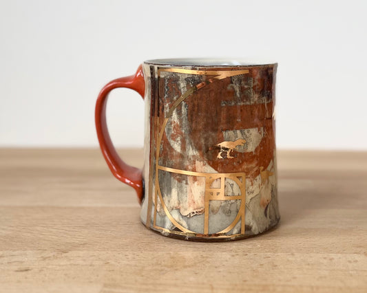 Mug with slip, gold decals and image transfer