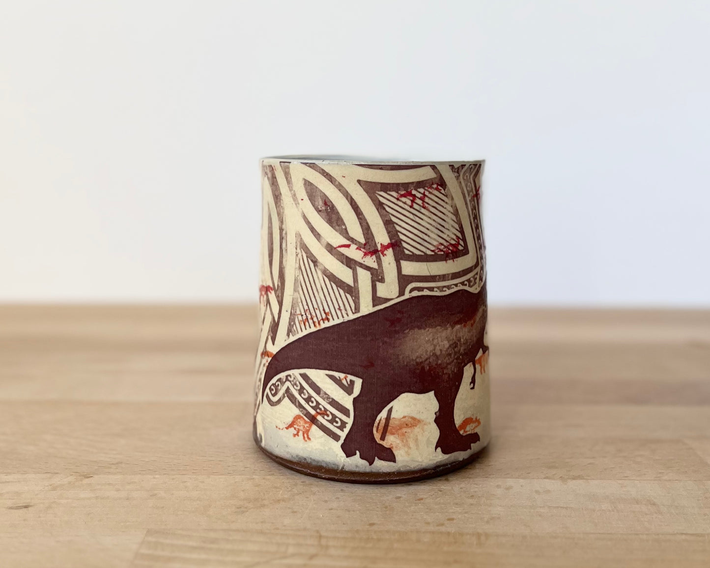 Mug with small red dinos with T-Rex
