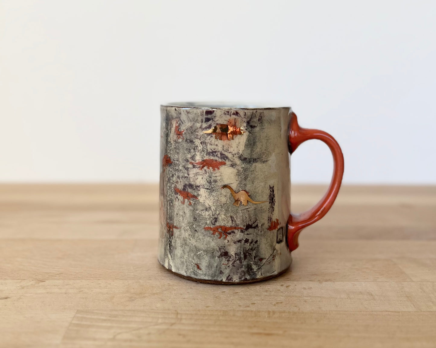 Mug with slip, gold decals and image transfer