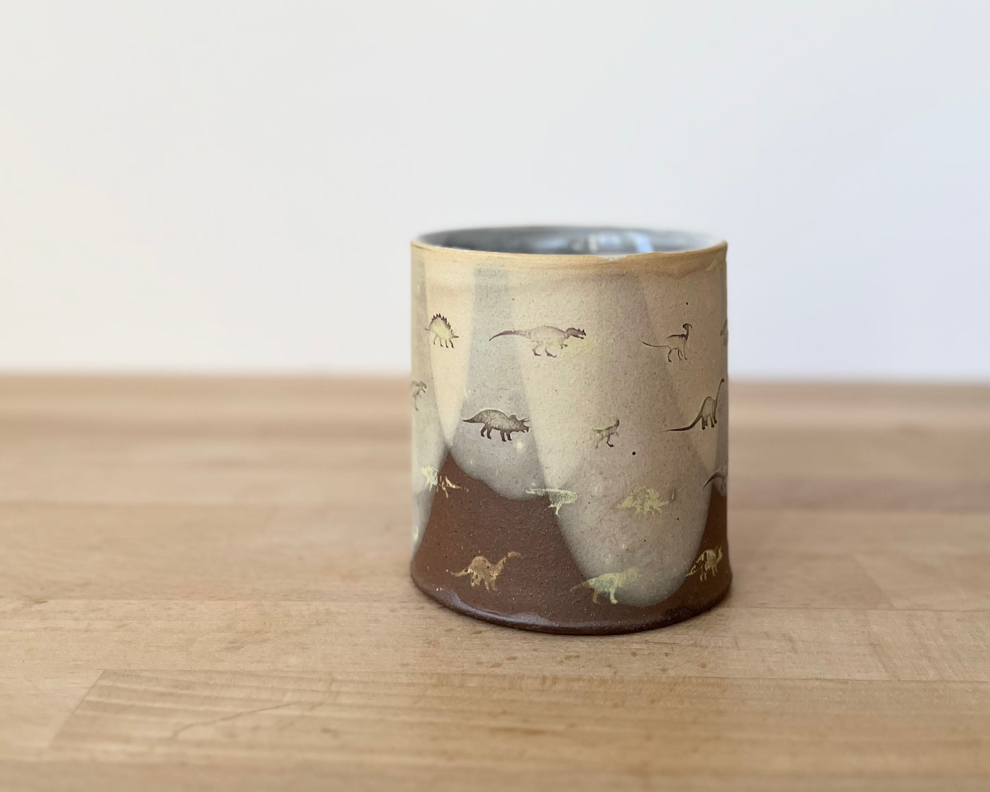 Mug with small light green dinos