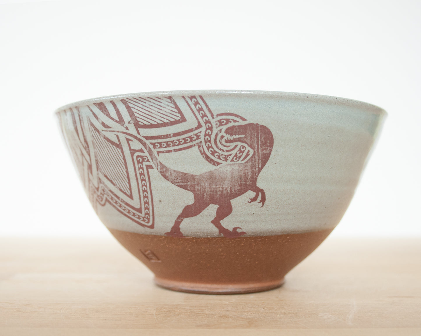 Velociraptor Bowl with background pattern - blue