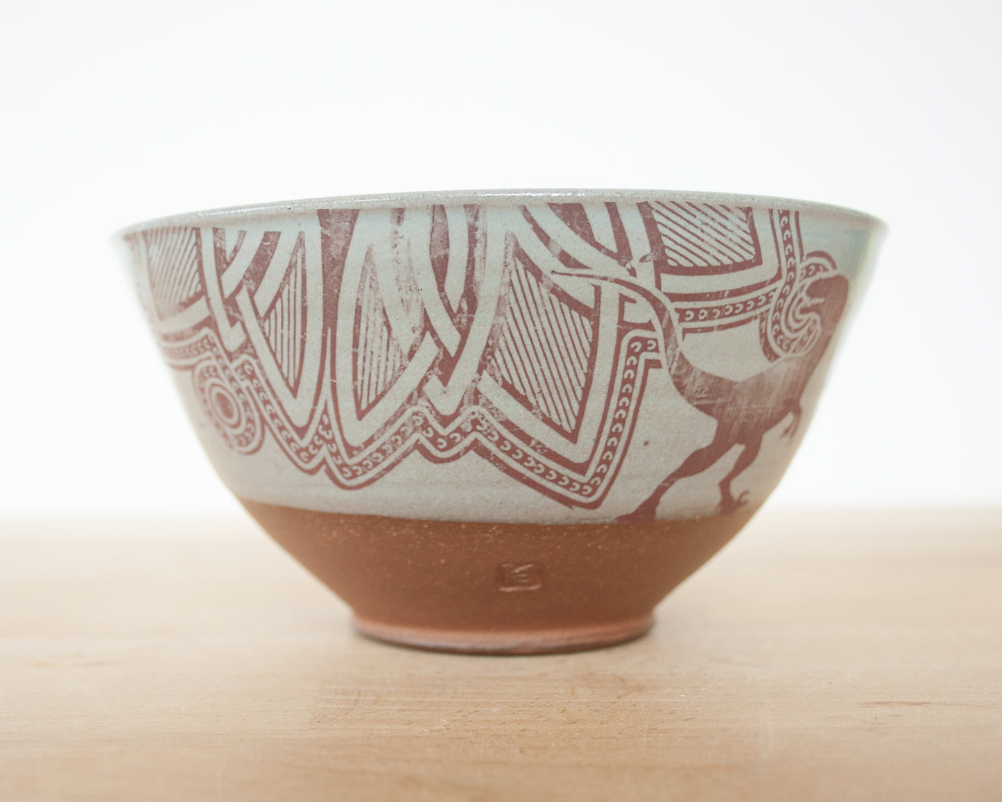 Velociraptor Bowl with background pattern - blue