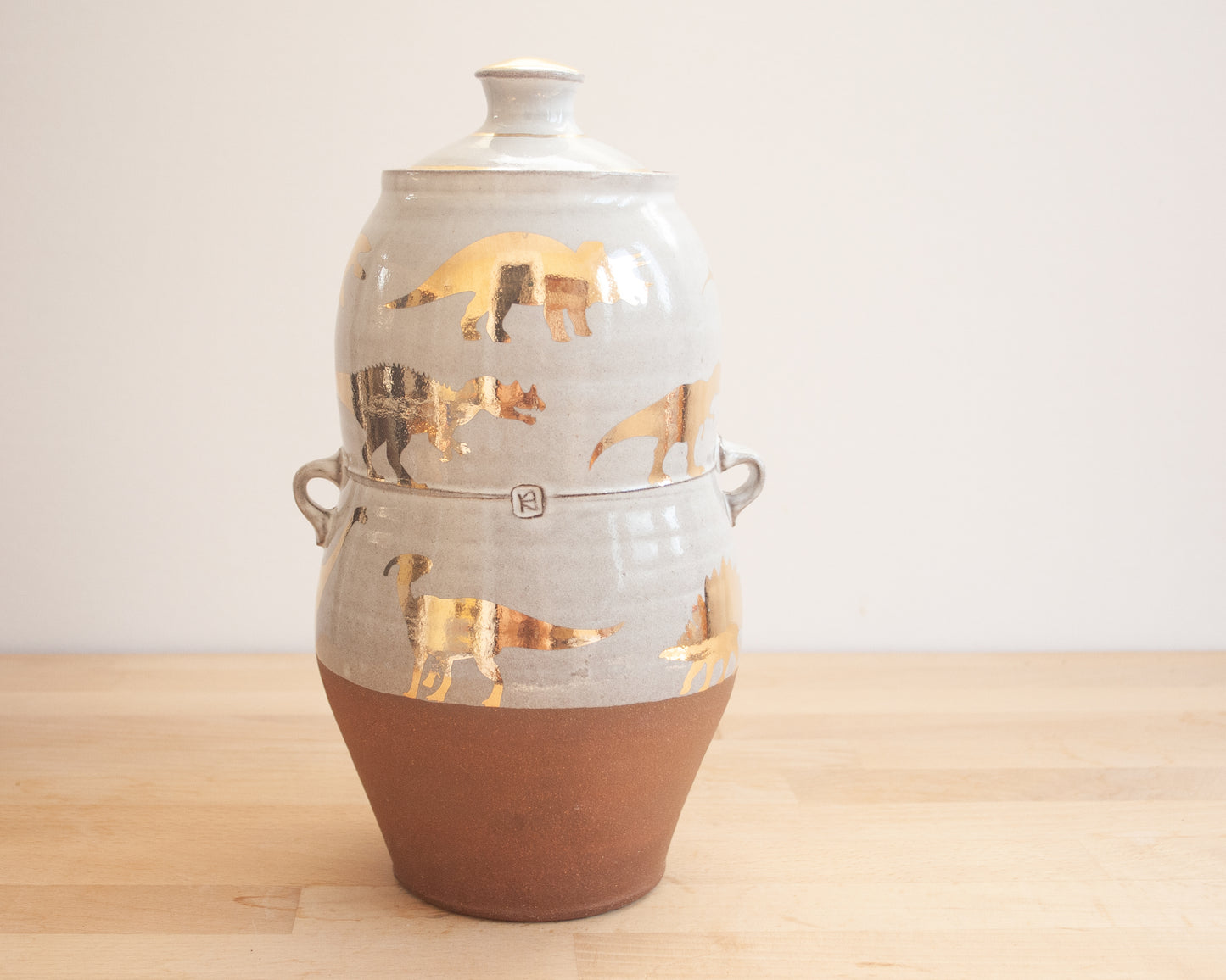 Lidded Jar with Gold Dinosaurs