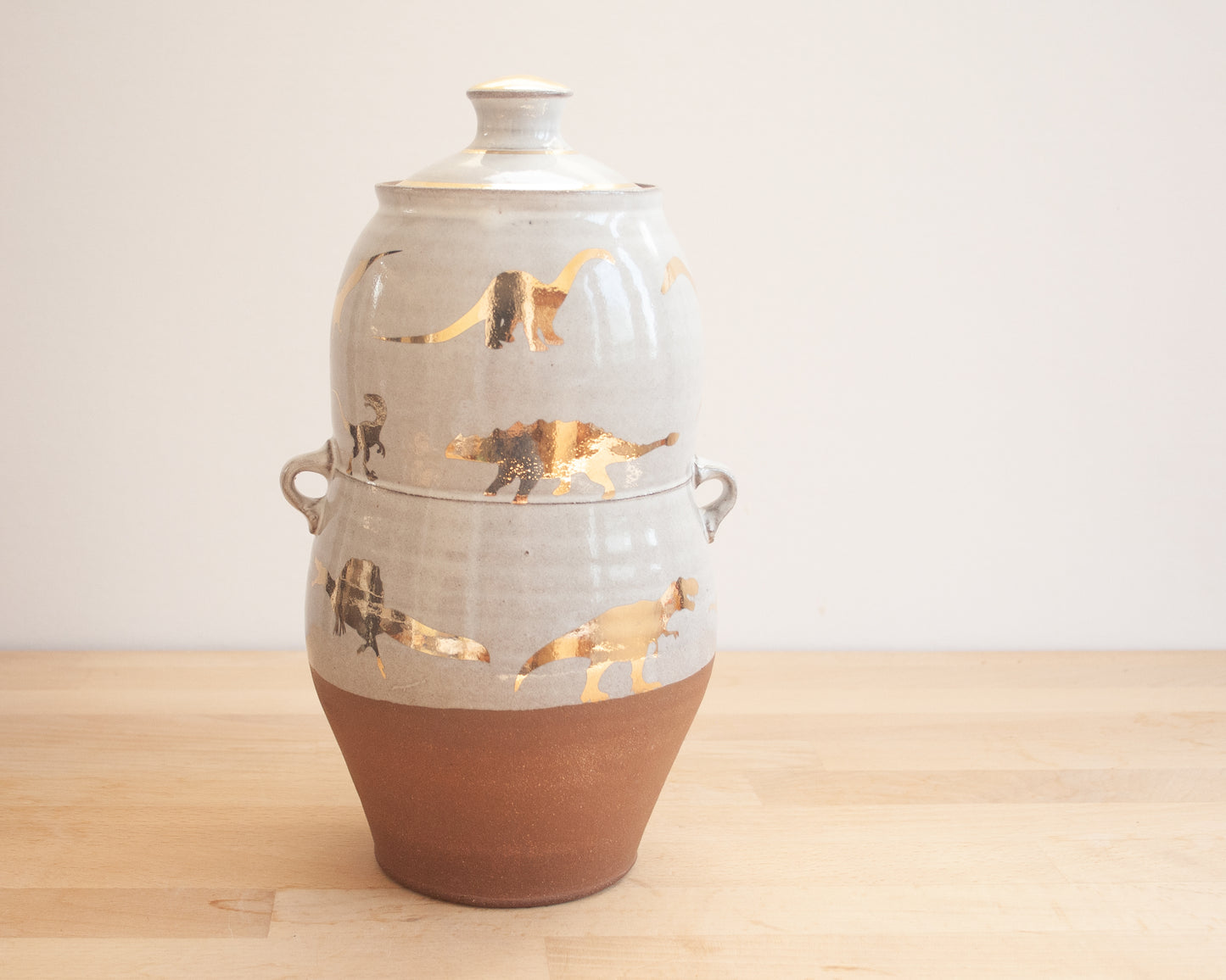 Lidded Jar with Gold Dinosaurs