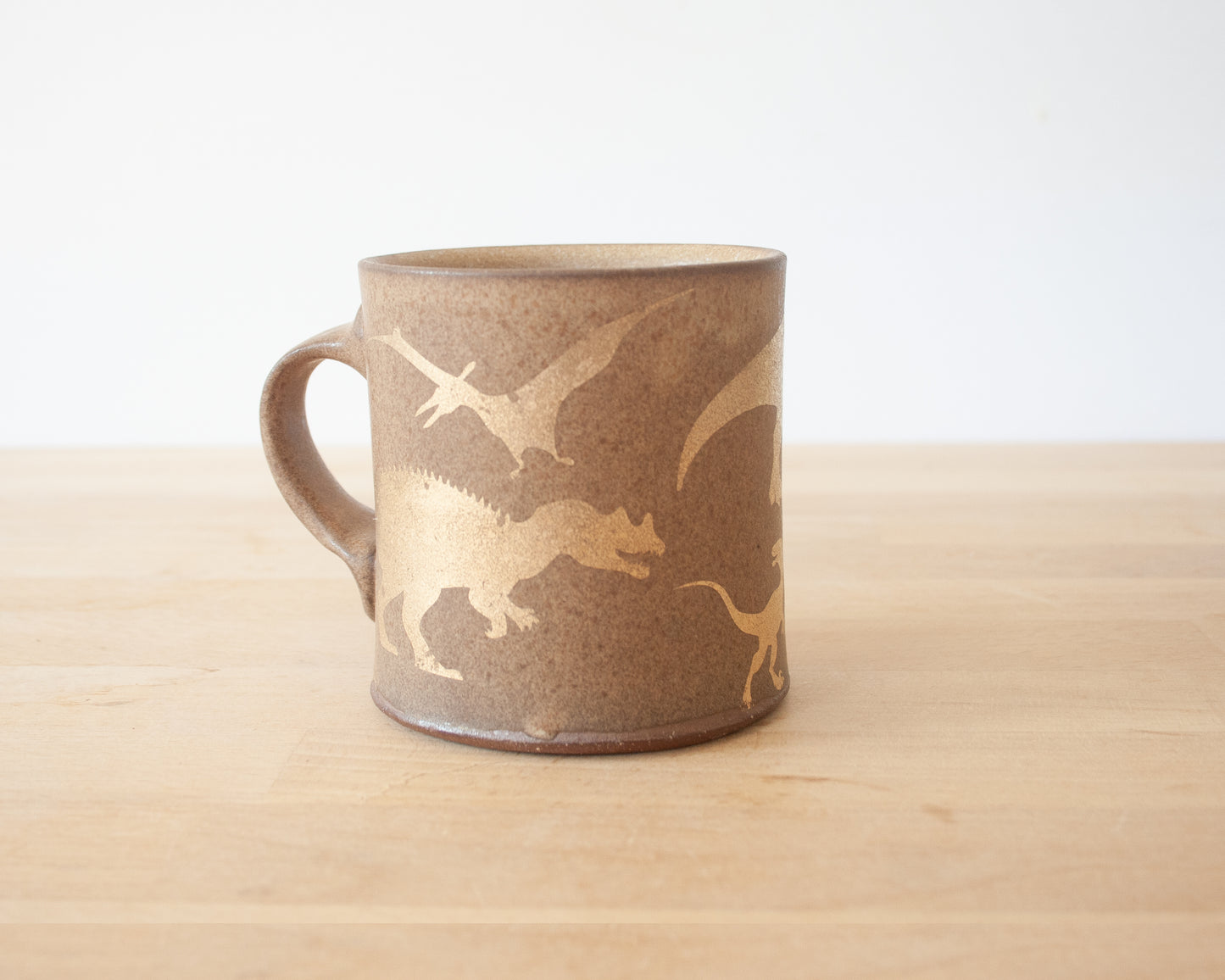 Gold Dinosaur Mug with Matte Brown Glaze