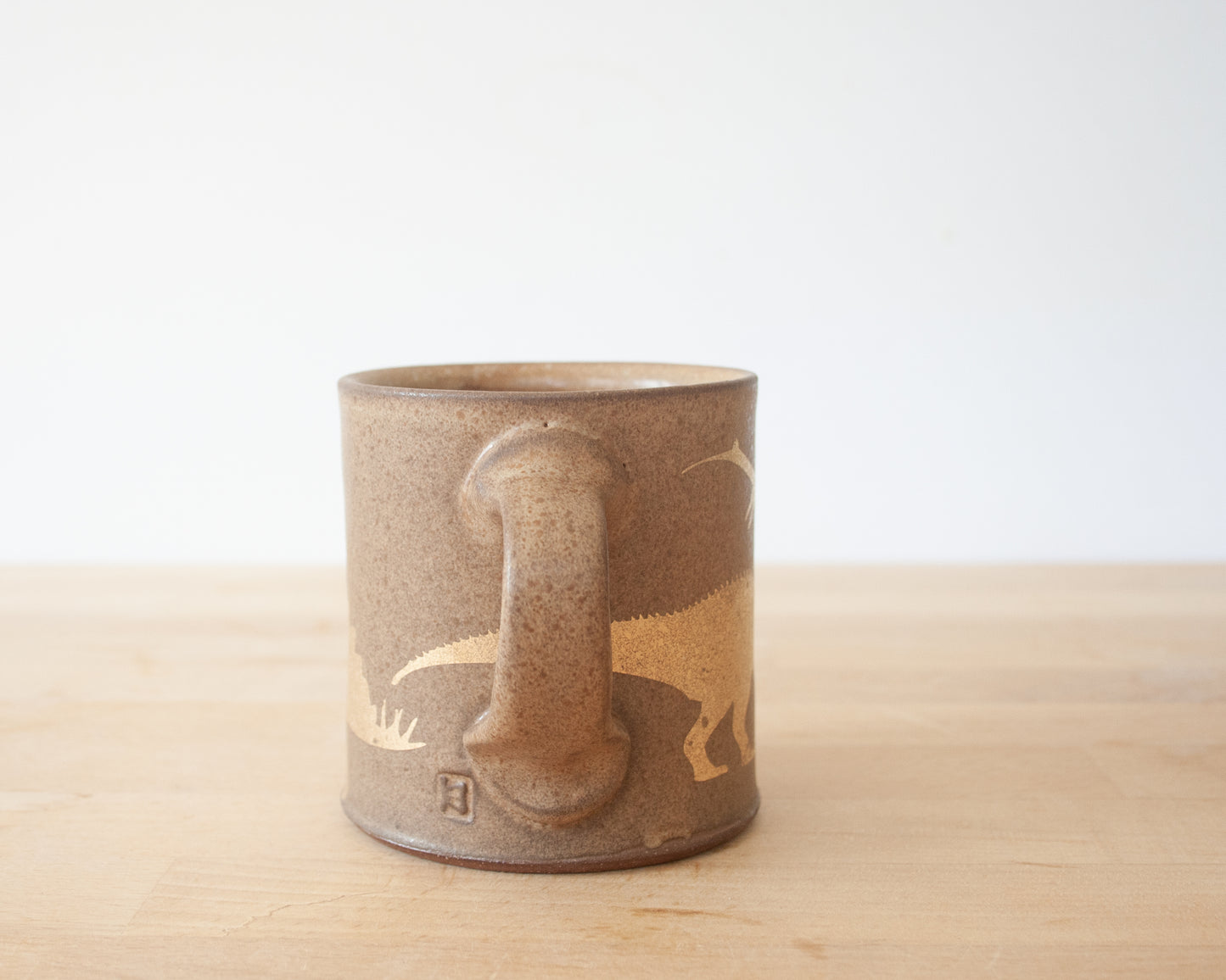 Gold Dinosaur Mug with Matte Brown Glaze
