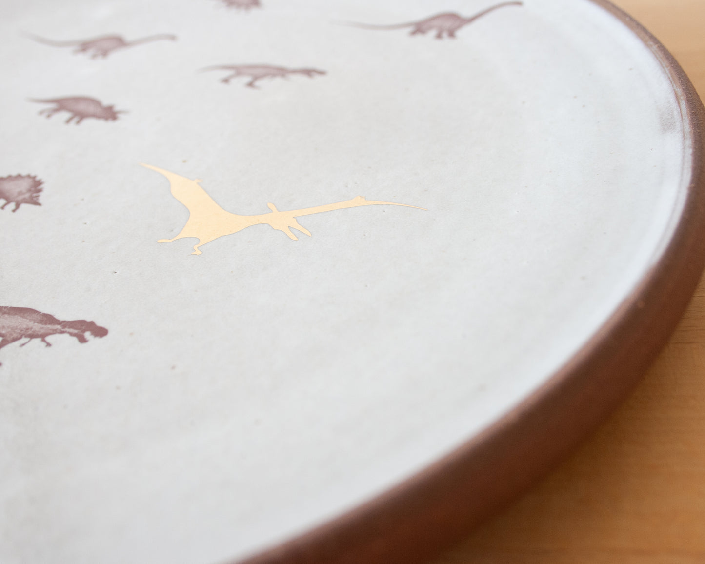 Gold Pterodactyl Plate with little dinos