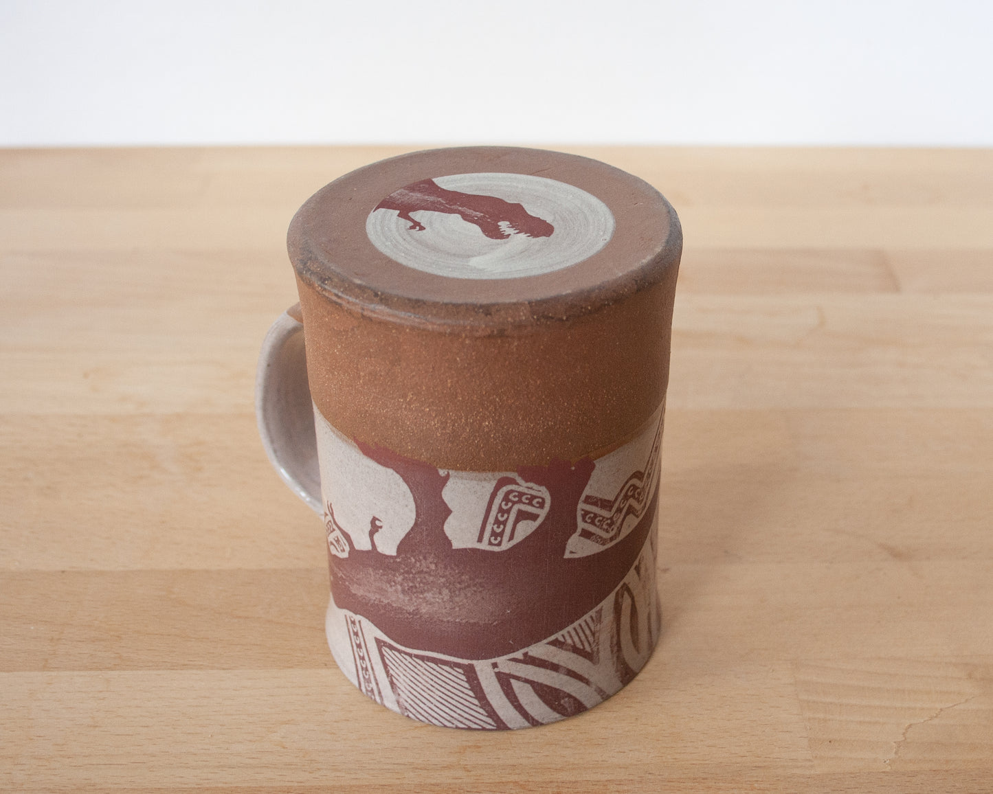 T-Rex Mug with background pattern - pale pink