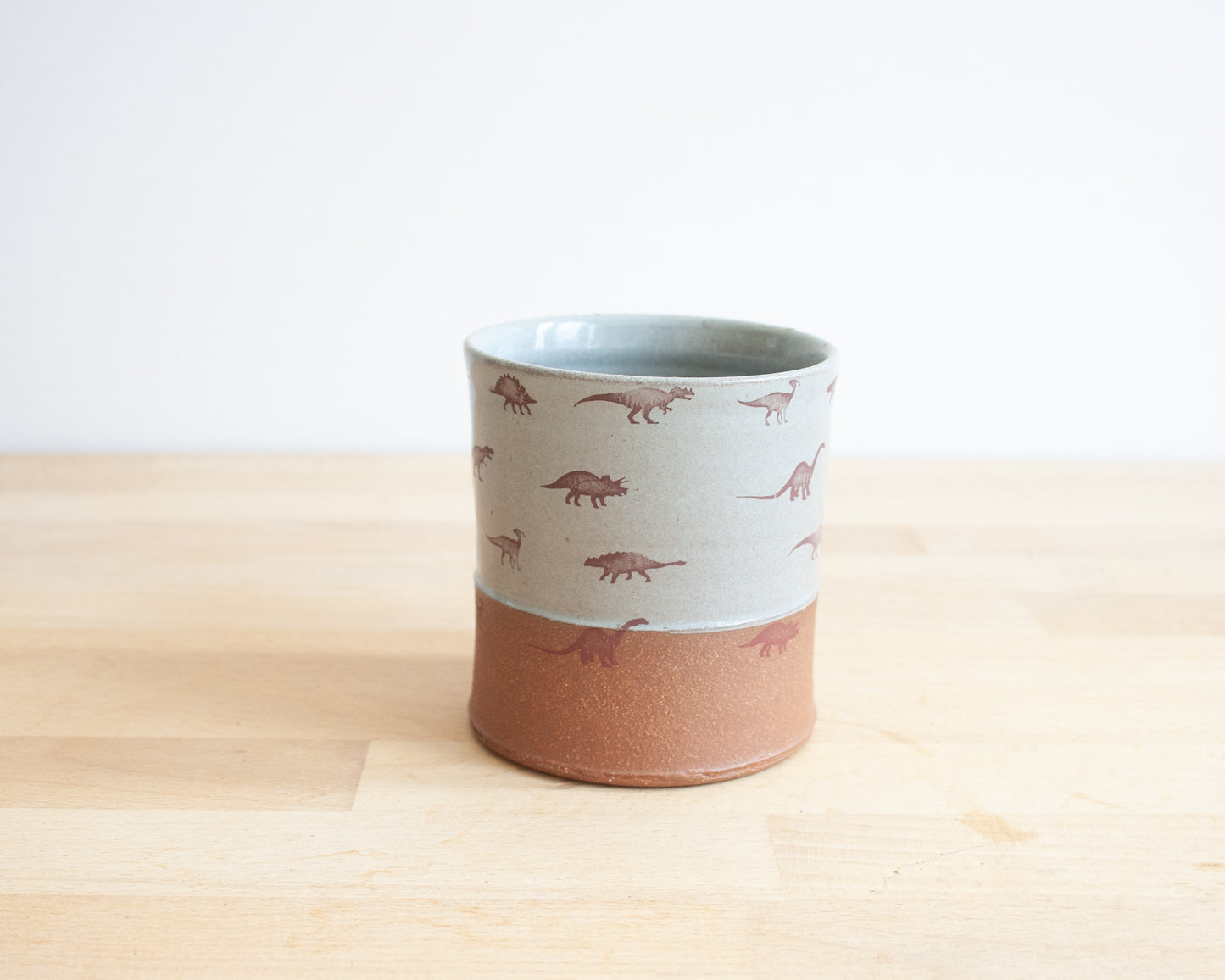 Cup with small dino pattern - blue