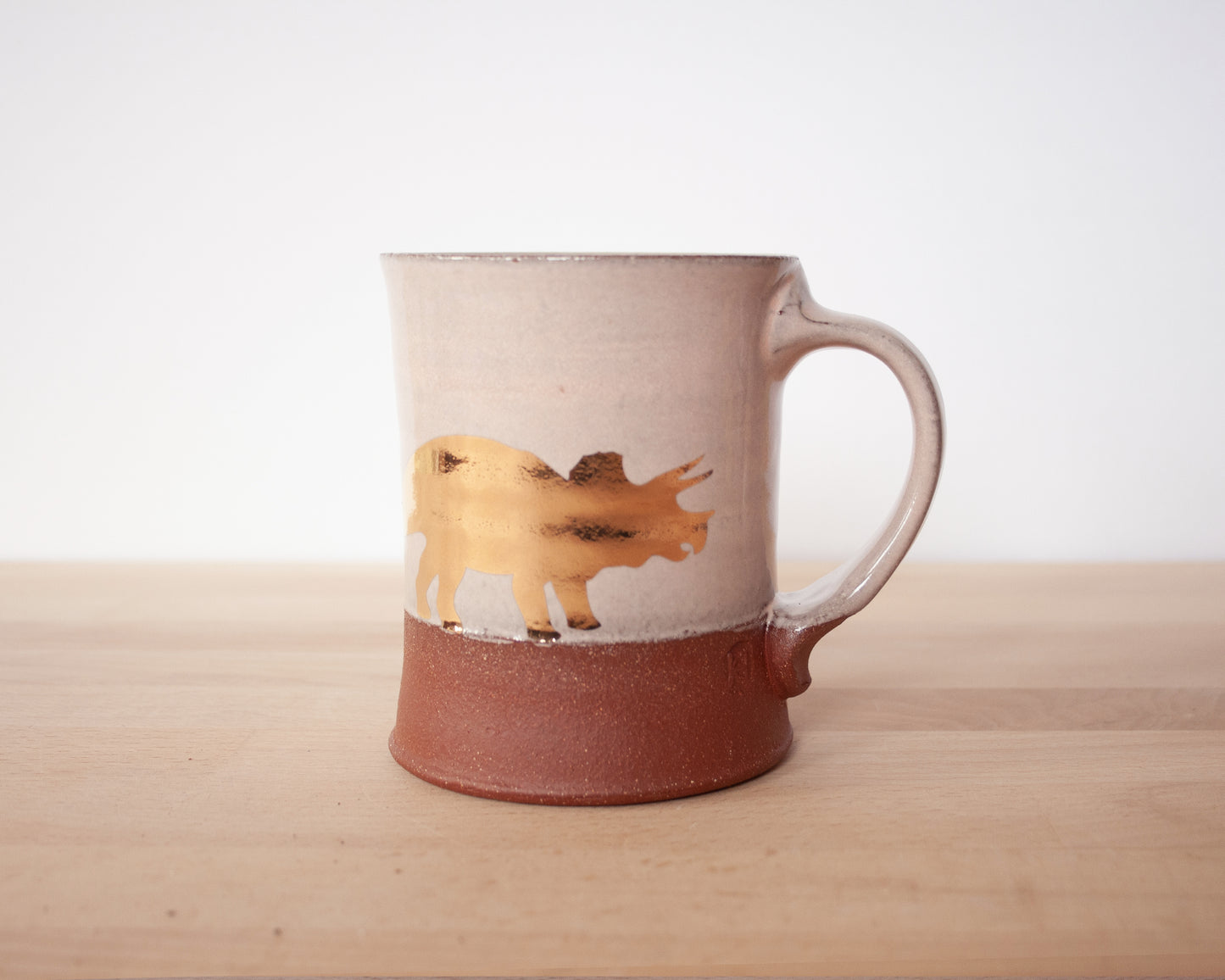 Gold Triceratops Mug - pale pink