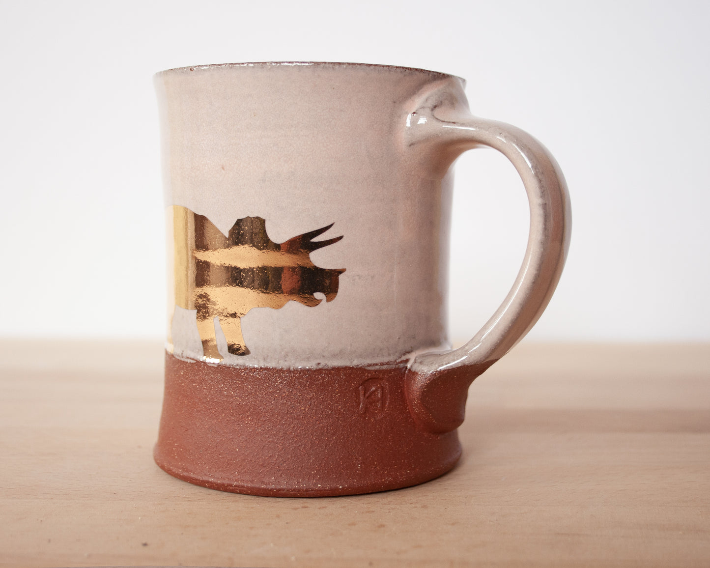 Gold Triceratops Mug - pale pink