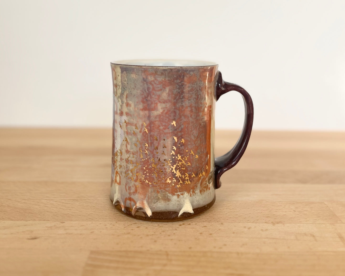 Mug with slip, gold decals and image transfer