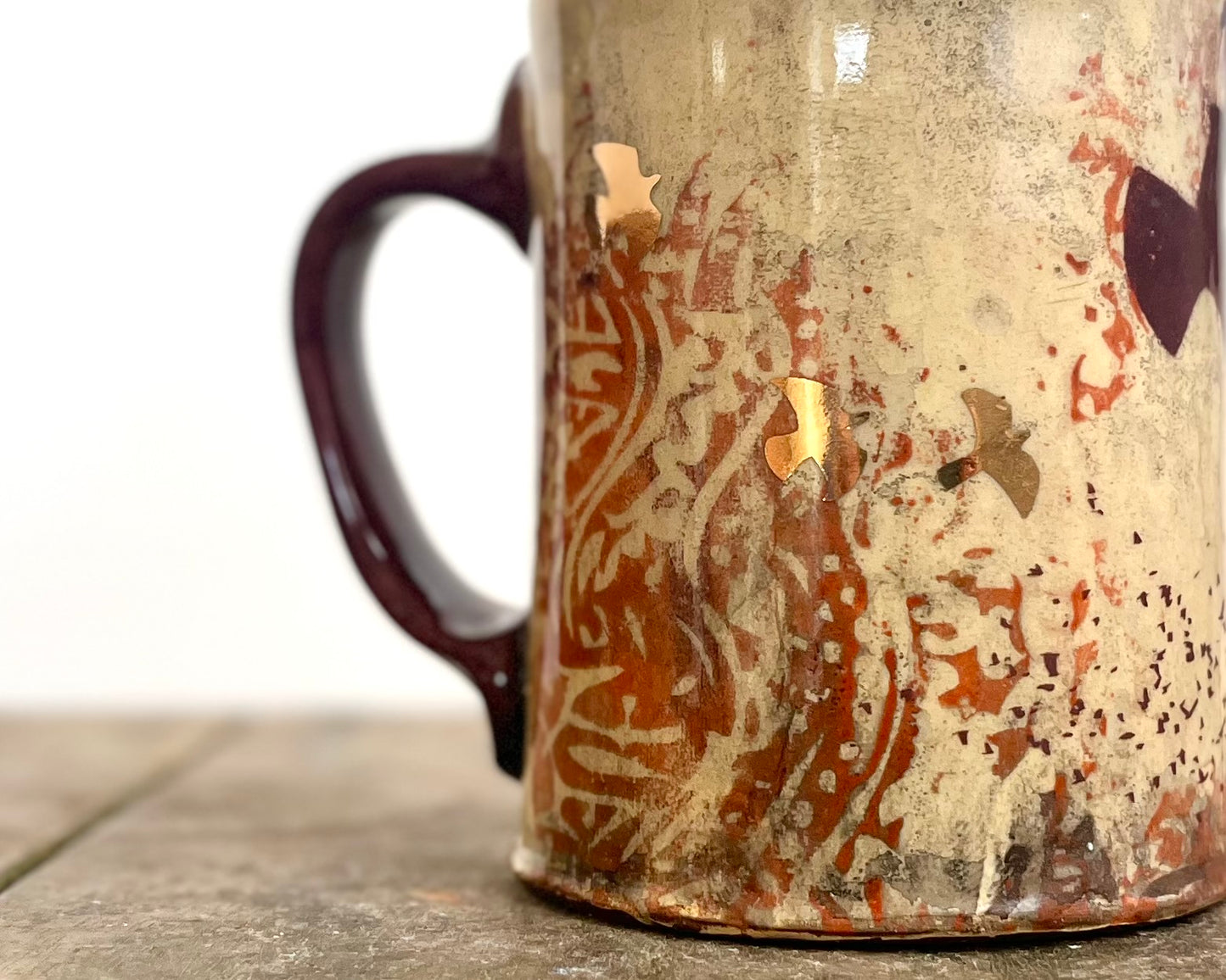 Mug with slip, gold decals and image transfer