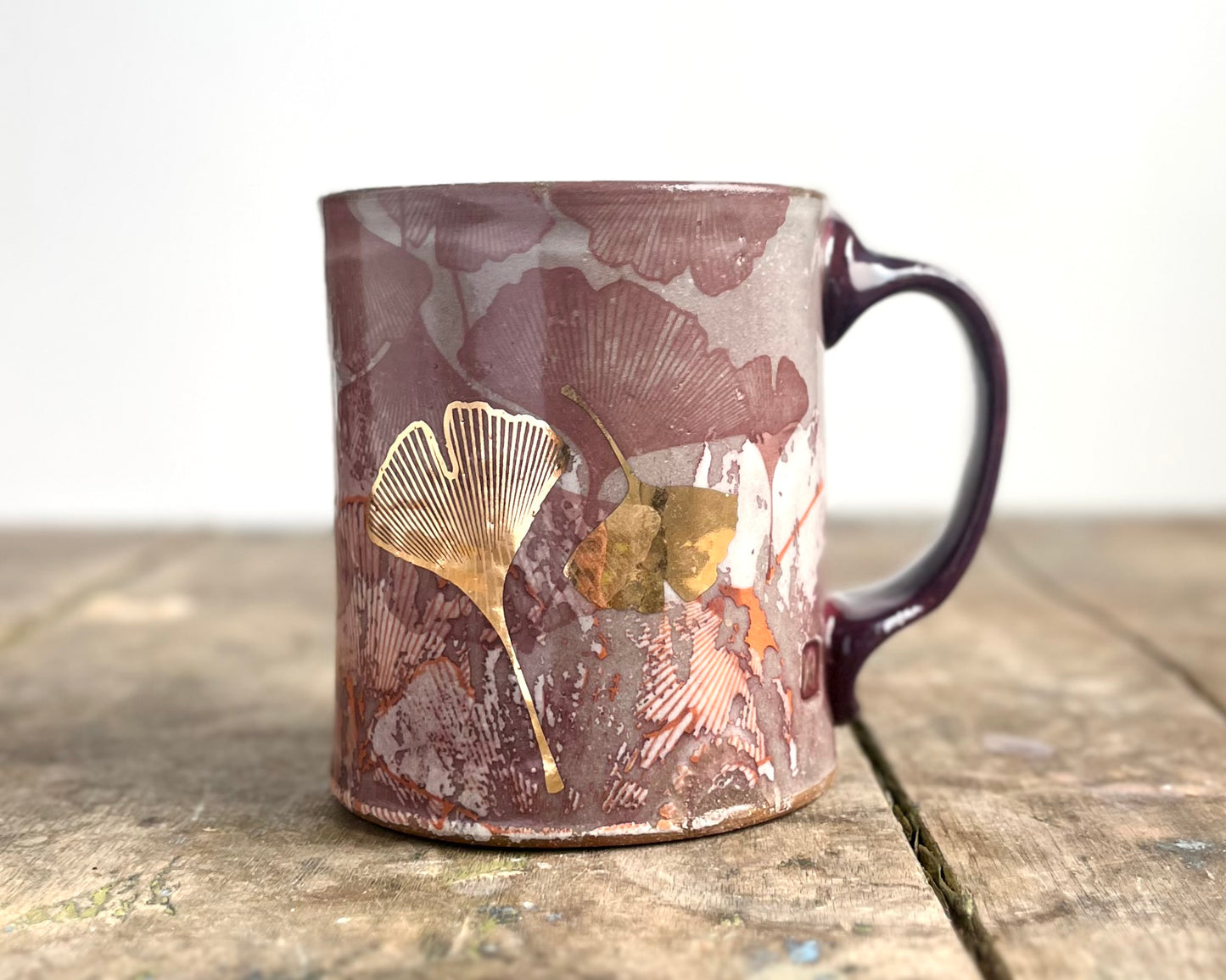Mug with slip, gold decals and image transfer