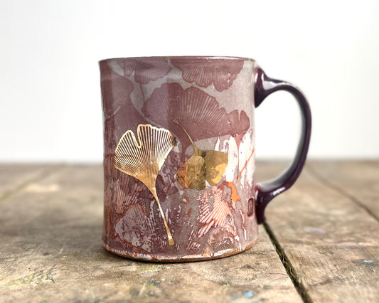 Mug with slip, gold decals and image transfer