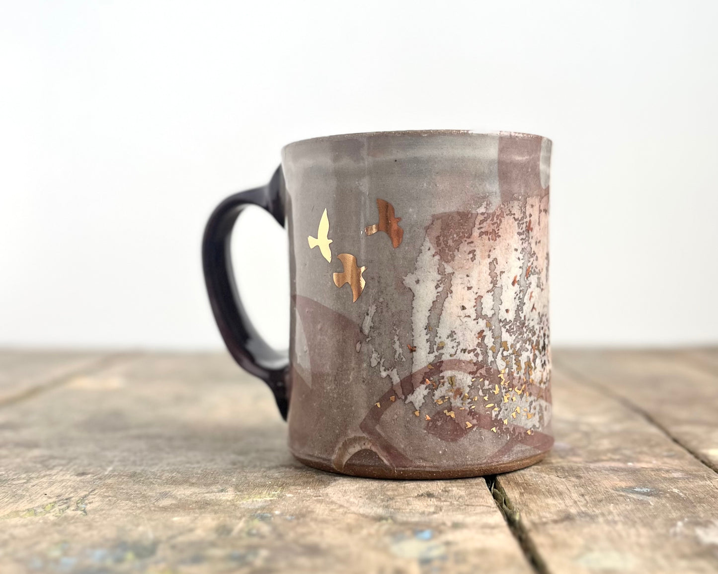 Mug with slip, gold decals and image transfer