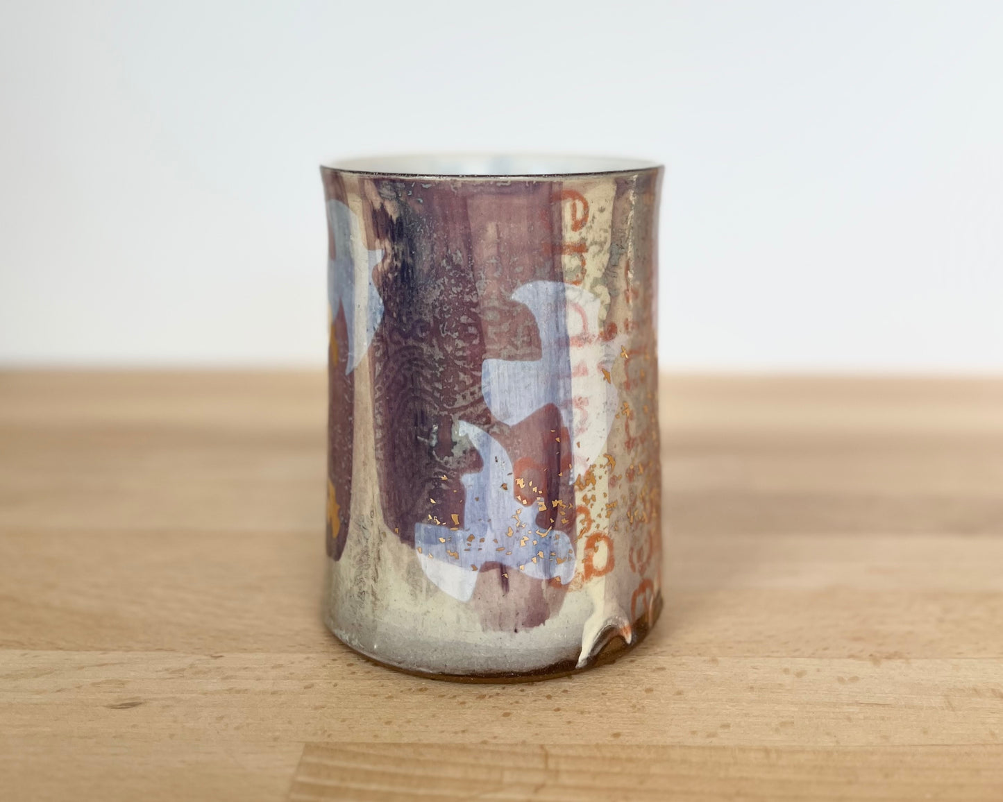 Mug with slip, gold decals and image transfer