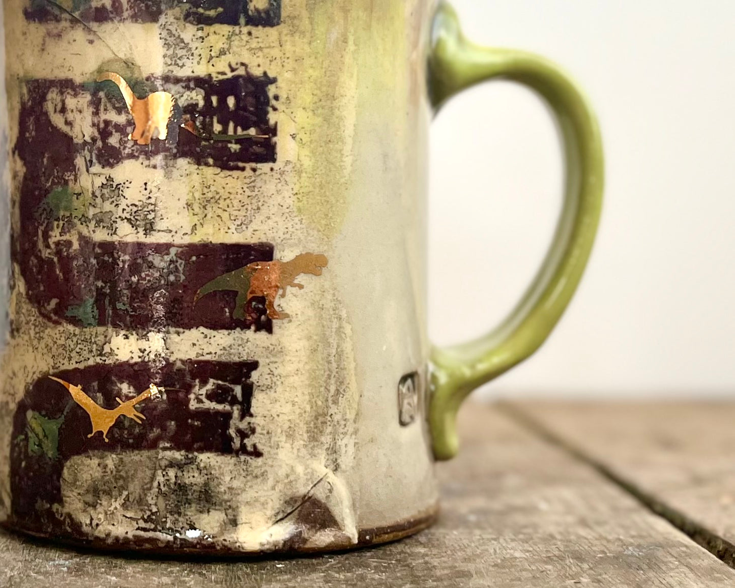 Mug with slip, gold decals and image transfer