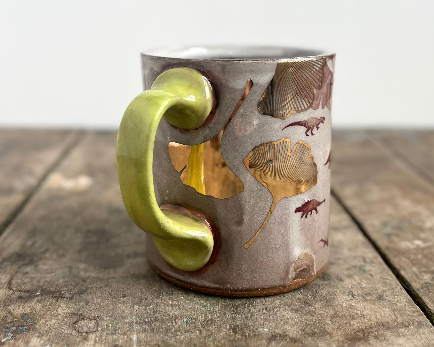 Mug with slip, gold decals and image transfer